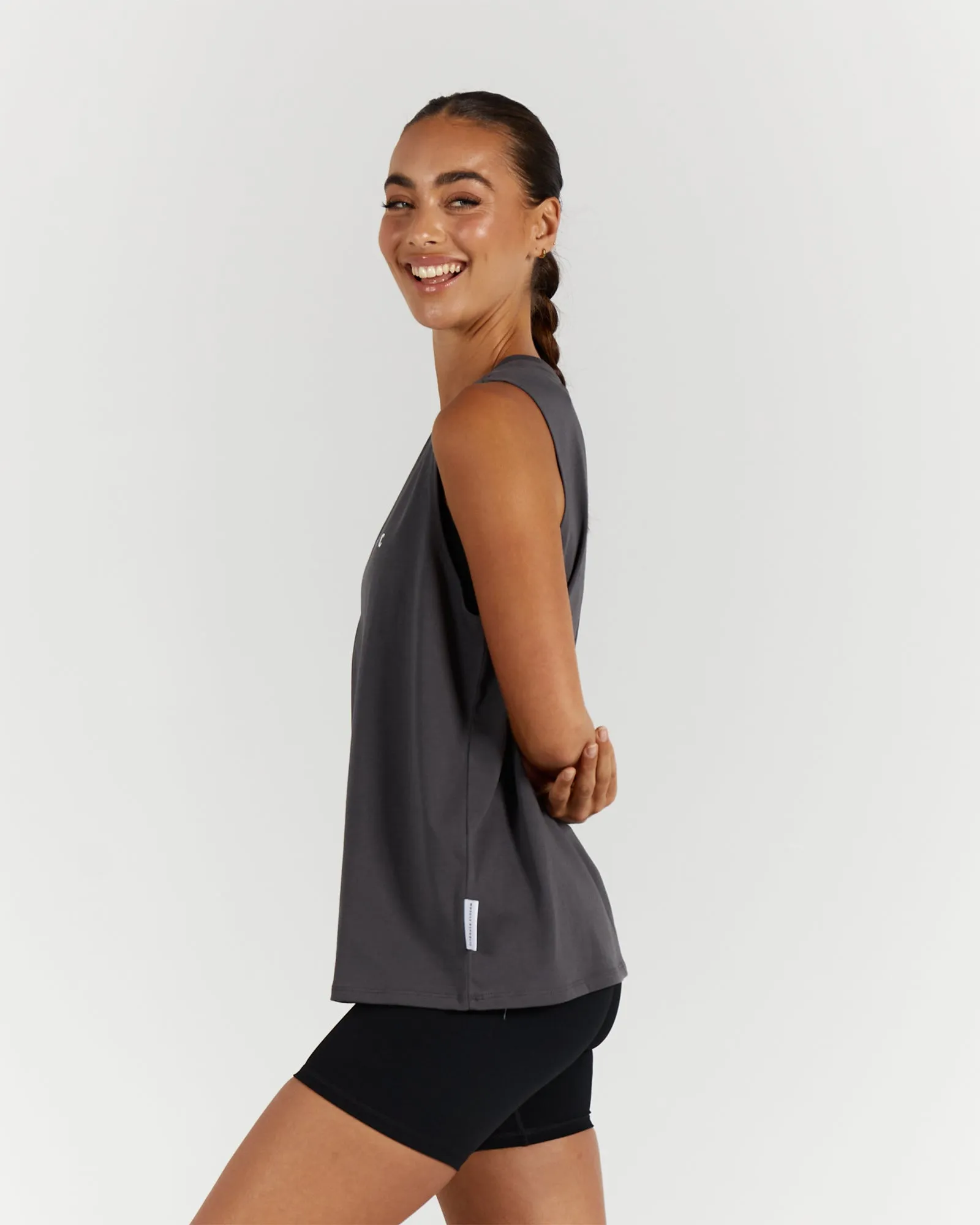 Optimized Title: Sleek Shadow Loose Fit Tank Top